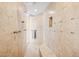 Large walk-in shower with built-in seat and dual shower heads at 23461 N 80Th Way, Scottsdale, AZ 85255