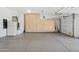 Spacious garage with ample storage cabinets and epoxy flooring at 23461 N 80Th Way, Scottsdale, AZ 85255
