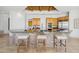 Large kitchen island with granite countertop and wood cabinets at 23461 N 80Th Way, Scottsdale, AZ 85255