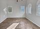 Well-lit bedroom with tile flooring and window shutters at 12446 W Bajada Rd, Peoria, AZ 85383