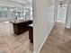 View of kitchen island and Gathering room from hallway at 12446 W Bajada Rd, Peoria, AZ 85383