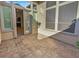 Covered patio with tiled flooring and access to backyard at 12446 W Bajada Rd, Peoria, AZ 85383