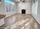 Bright living room with fireplace and tile flooring at 12446 W Bajada Rd, Peoria, AZ 85383