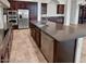 Kitchen island with granite countertop and stainless steel appliances at 12446 W Bajada Rd, Peoria, AZ 85383