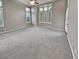Spacious Primary bedroom with neutral carpeting and window shutters at 12446 W Bajada Rd, Peoria, AZ 85383