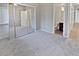 Bedroom with mirrored closet doors and en-suite bathroom at 12446 W Bajada Rd, Peoria, AZ 85383