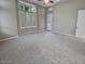 Spacious primary bedroom with large windows and plush carpeting at 12446 W Bajada Rd, Peoria, AZ 85383