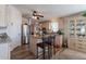 Modern kitchen featuring stainless steel appliances and wood flooring at 201 S Greenfield Rd # 176, Mesa, AZ 85206