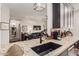Modern kitchen with dark cabinetry, granite countertops and a black farmhouse sink at 14950 W Mountain View Blvd # 4205, Surprise, AZ 85374