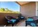 Private balcony with wicker furniture and lovely views at 14950 W Mountain View Blvd # 4205, Surprise, AZ 85374