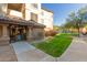 Building entrance with landscaping and walkway at 14950 W Mountain View Blvd # 4205, Surprise, AZ 85374