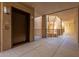 Building hallway with elevator access and tiled floors at 14950 W Mountain View Blvd # 4205, Surprise, AZ 85374