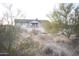 New construction home with gray exterior and desert landscaping at 14794 N Dogwood Rd, Florence, AZ 85132