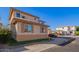 Two-story home with tan exterior and two-car garage at 7414 S 27Th Way, Phoenix, AZ 85042