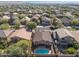Aerial view showing house, pool, and neighborhood at 2412 W Crimson Ter, Phoenix, AZ 85085
