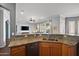 Kitchen with granite countertops and stainless steel appliances at 2412 W Crimson Ter, Phoenix, AZ 85085