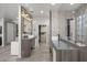 Elegant bathroom with double sinks, walk-in shower, and ample storage at 8614 E Berridge Ln, Scottsdale, AZ 85250