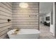 Elegant bathroom featuring a freestanding tub and designer tile at 8614 E Berridge Ln, Scottsdale, AZ 85250