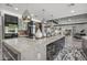 Contemporary kitchen with a large island and breakfast bar, offering plenty of seating at 8614 E Berridge Ln, Scottsdale, AZ 85250