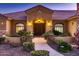 Grand entrance with double doors and stone accents at 18135 W Missouri Ave, Litchfield Park, AZ 85340