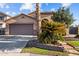 Single story home with two car garage and desert landscaping at 15912 W Central St, Surprise, AZ 85374