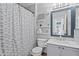 Clean bathroom with a toilet, sink, and shower/tub combo at 15912 W Central St, Surprise, AZ 85374