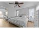 Bright bedroom with ensuite bathroom access and ceiling fan at 15912 W Central St, Surprise, AZ 85374