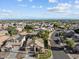 Wide aerial view showing the house and surrounding neighborhood at 15912 W Central St, Surprise, AZ 85374