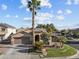 Single-story home with a two-car garage and landscaped yard at 15912 W Central St, Surprise, AZ 85374
