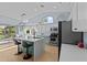 Modern kitchen with a large island, white and teal cabinets at 15912 W Central St, Surprise, AZ 85374