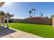 Artificial turf backyard with large grassy area at 4302 N 80Th Ln, Phoenix, AZ 85033