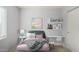 Charming bedroom with a twin bed and desk area at 4302 N 80Th Ln, Phoenix, AZ 85033
