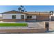 Updated single-story home with artificial turf and a 2-car garage at 4302 N 80Th Ln, Phoenix, AZ 85033