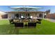 Outdoor patio with seating for dining al fresco at 4302 N 80Th Ln, Phoenix, AZ 85033
