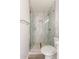 Contemporary bathroom with marble tile shower and walk-in shower at 4302 N 80Th Ln, Phoenix, AZ 85033
