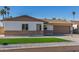 Remodeled single-story home with artificial turf and a 2-car garage at 4302 N 80Th Ln, Phoenix, AZ 85033