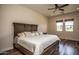 Bright bedroom featuring a king-size bed and desert views at 27000 N Alma School Pkwy # 2004, Scottsdale, AZ 85262