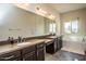 Relaxing bathroom with a soaking tub and double vanity at 27000 N Alma School Pkwy # 2004, Scottsdale, AZ 85262