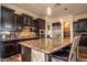 Modern kitchen with granite countertops and stainless steel appliances at 27000 N Alma School Pkwy # 2004, Scottsdale, AZ 85262