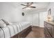 Guest bedroom with carpet, ceiling fan, and dresser at 16640 N 54Th St, Scottsdale, AZ 85254