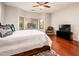 Main bedroom with wood floors and bay window at 15877 W Arrowhead Dr, Surprise, AZ 85374