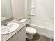 Clean bathroom with granite vanity, tub, and shower at 8572 W Raven Dr, Arizona City, AZ 85123
