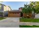 Charming Craftsman home with a two-car garage and manicured lawn at 4337 E Cullumber St, Gilbert, AZ 85234