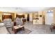 Spacious living room with comfortable seating and tile floors at 18483 N Deer Grass Ct, Surprise, AZ 85374