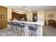 Modern kitchen with granite countertops and island at 18483 N Deer Grass Ct, Surprise, AZ 85374