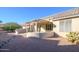 Landscaped backyard with gravel and desert plants at 18483 N Deer Grass Ct, Surprise, AZ 85374