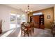 Dining area with access to backyard patio at 18483 N Deer Grass Ct, Surprise, AZ 85374