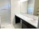 Elegant bathroom with a large vanity, a soaking tub, and a separate shower at 1988 W Cameron Blvd, Coolidge, AZ 85128