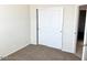 Spacious bedroom with a large closet and neutral-toned carpet at 1988 W Cameron Blvd, Coolidge, AZ 85128