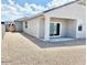 Private backyard with a covered patio and gravel landscaping at 1988 W Cameron Blvd, Coolidge, AZ 85128